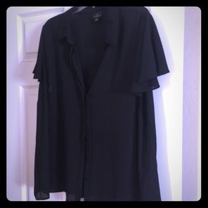 Black collared, button up, sheer shirt. Very cute!